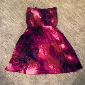 Strapless dress with ties in the back. Size L